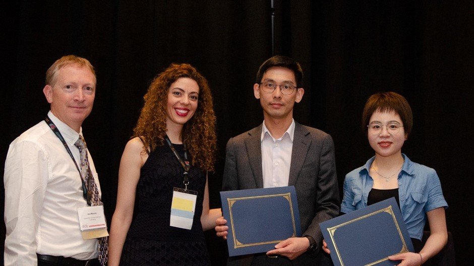 Dr Louis Wong (2nd right) and Ms Yahui Zhang (1st right) received the Best Paper Award from the ARMA President Dr. Joseph P. Morris (1st left) and the 53rd US Rock Mechanics / Geomechanics Symposium Co-Chair Dr Evangelia Ieronymaki (2nd left)