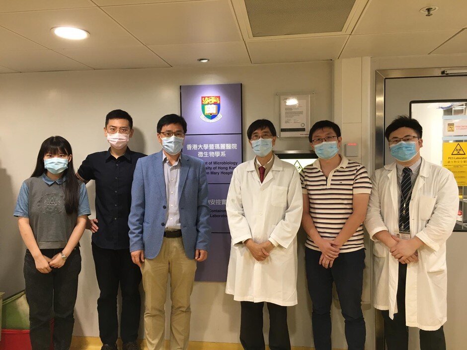 Key members of the research team. From the right: Dr Jasper F W CHAN, Dr Shuofeng YUAN, Professor Kwok-Yung YUEN, Professor Hongzhe SUN, Dr Runming WANG and Miss Suyu WANG.