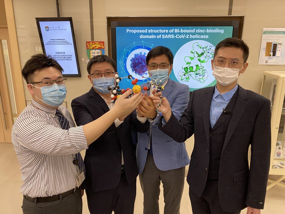 The team with the molecular structure of RBC. From the right: Dr Runming WANG, Professor Hongzhe SUN, Dr Shuofeng YUAN and Dr Jasper F W CHAN