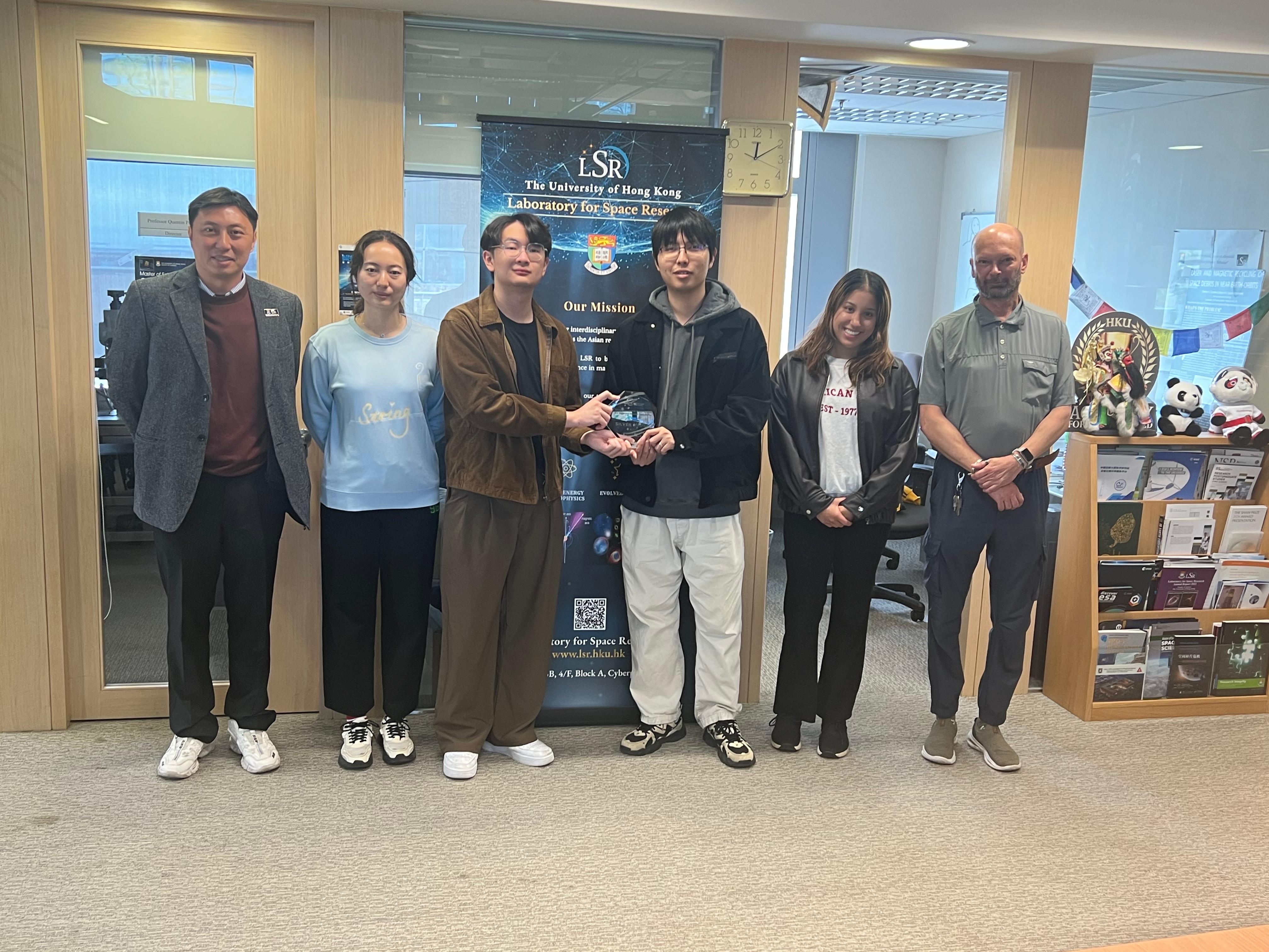 Spectro Team with the Sliver Trophy Dr. Chung To Kong (Andy), Mingyu Tian, Chan Kwun Yin, Zhengjie Tian, Maria Alejandra Gaubeca, Dr. Andreas Ritter