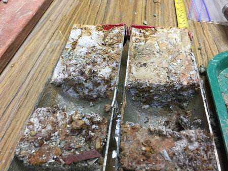 Sub-sampling a coral reef matrix core for further processing.